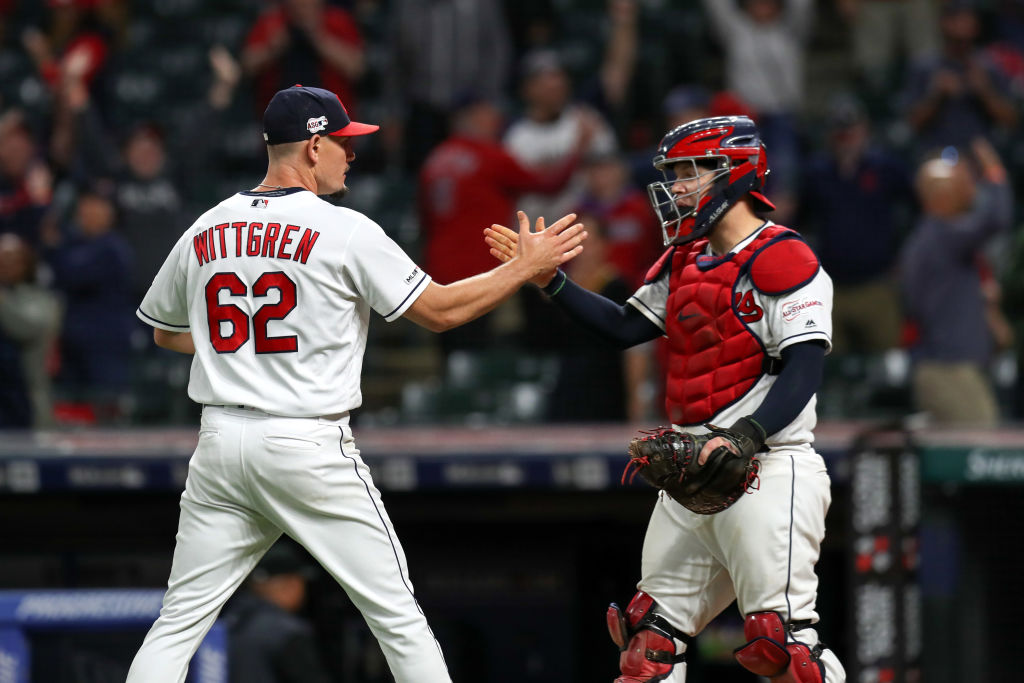 Cleveland Indians pitcher Nick Wittgren (62) is congratulated