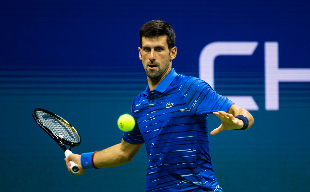 Novak Djokovic of Serbia hits a forehand