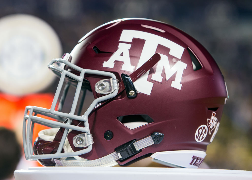 Texas A&M helmet rests on the sideline