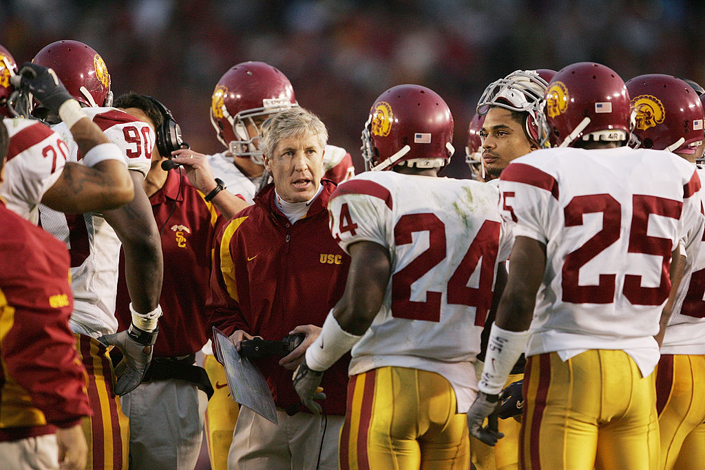 Head coach Pete Carroll of the USC Trojans talks to his team