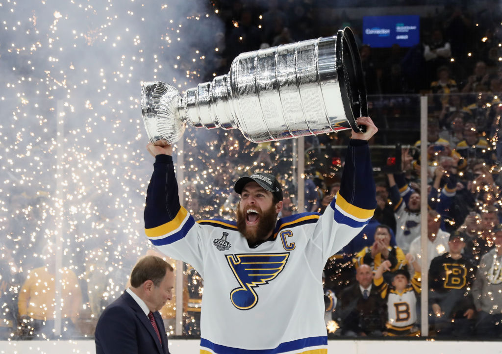 The St. Louis Blues lift the Stanley Cup as NHL champions.