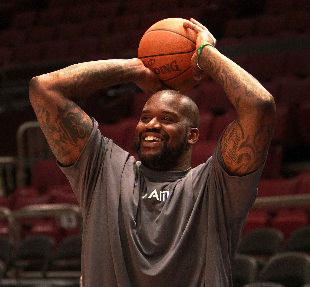 Boston Celtics center Shaquille O'Neal takes a shot at practice