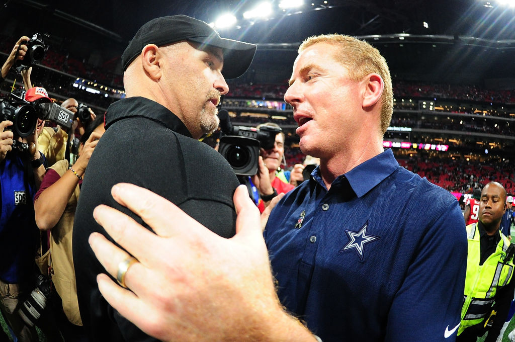 Head coach Dan Quinn of the Atlanta Falcons shakes hands with head coach Jason Garrett of the Dallas Cowboys