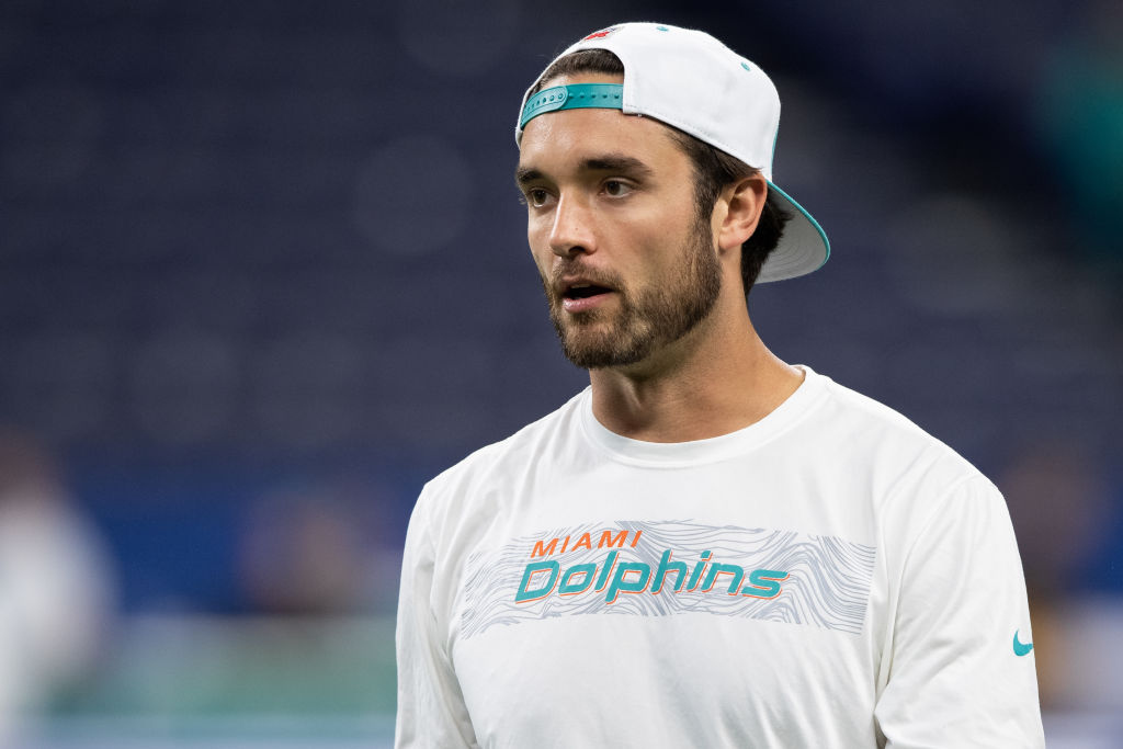 Miami Dolphins quarterback Brock Osweiler warms up before a NFL game