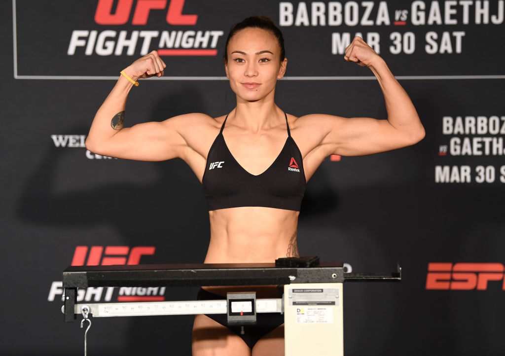 Michelle Waterson poses on the scale during the UFC Fight Night weigh-in