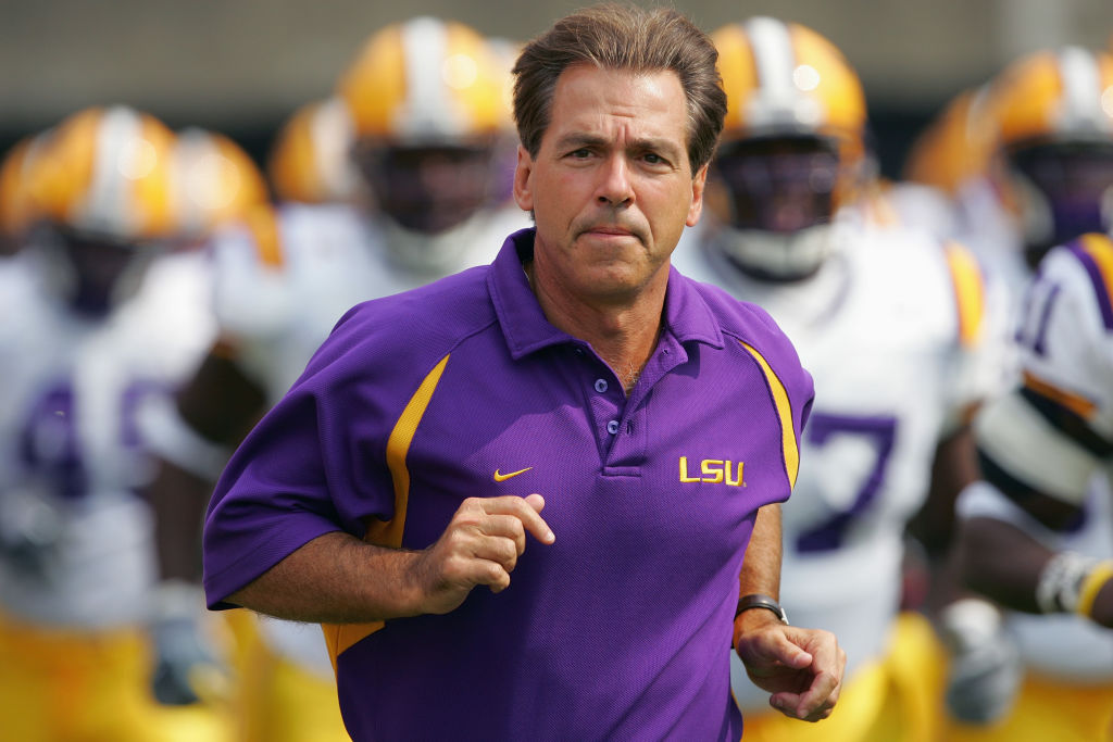 Nick Saban as coach of LSU, jogging onto the field.