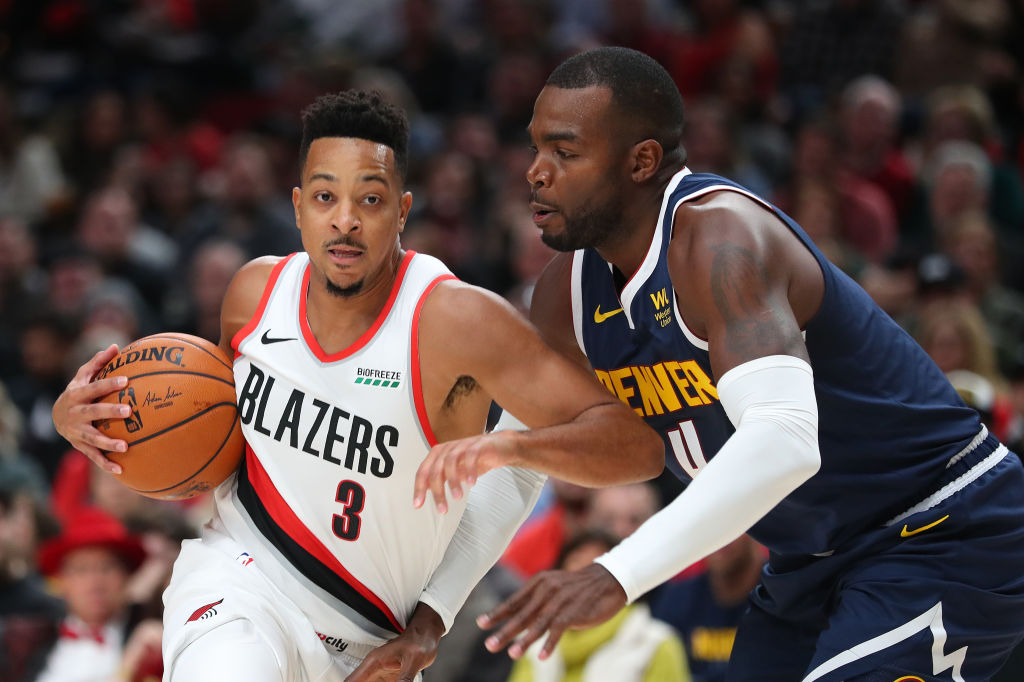 Paul Millsap defending CJ McCollum