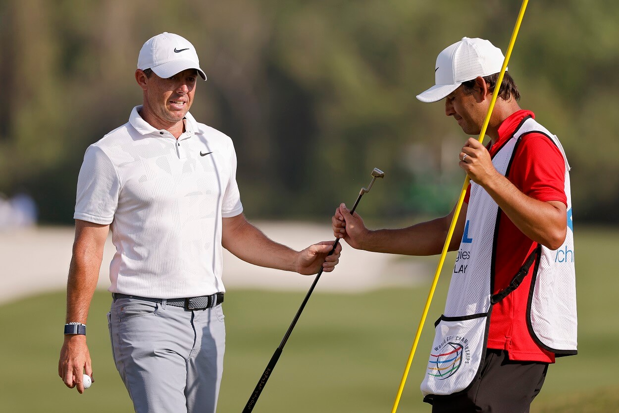 Rory McIlroy and his caddie during the 2023 WGC Match Play