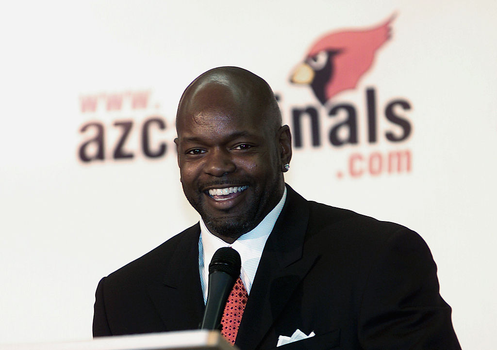 The NFL's all-time leading rusher, running back Emmitt Smith, speaks to the media