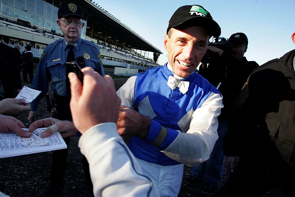 Jockey Russell Baze greets fans after winning his 9,531st race