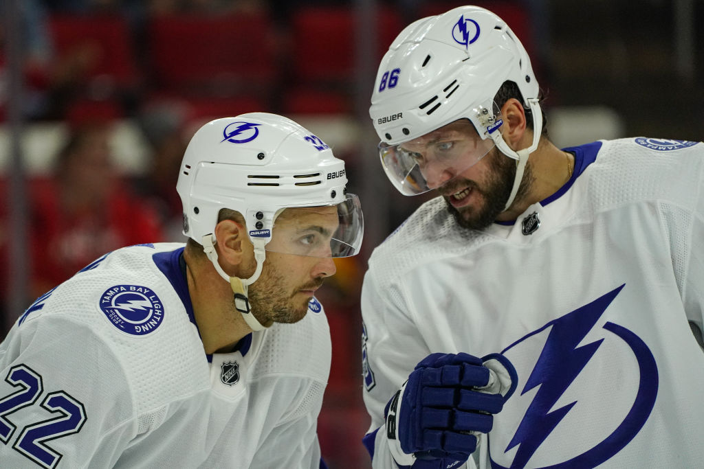 Two Tampa Bay Lightning talk strategy on the ice.