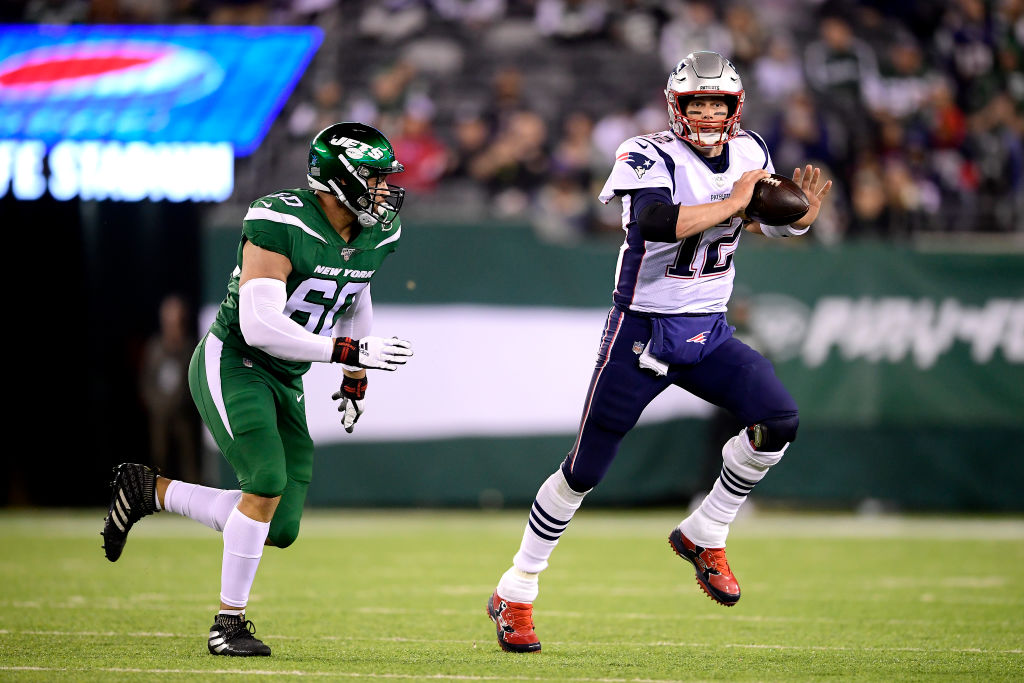 New England Patriots quarterback Tom Brady passes against the New York Jets.