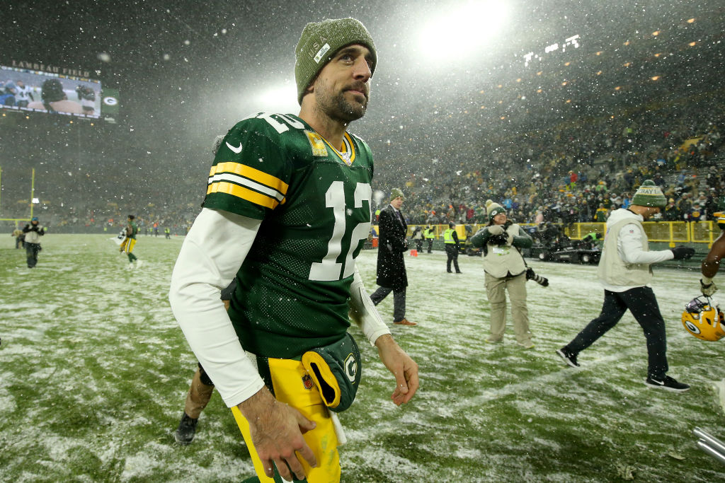 Aaron Rodgers of the Green Bay Packers looks on after defeating the Carolina Panthers in the snow