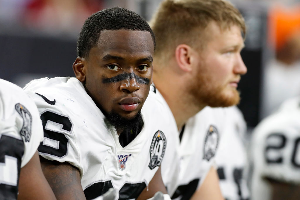 Clelin Ferrell #96 of the Oakland Raiders rests on the bench