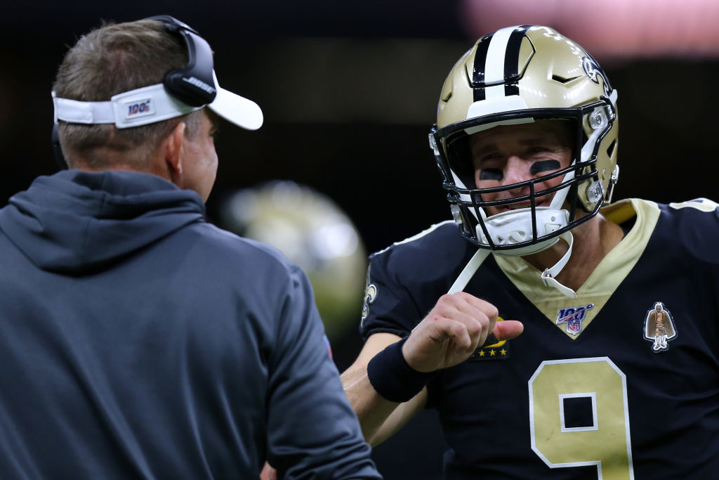 Drew Brees #9 of the New Orleans Saints and head coach Sean Payton