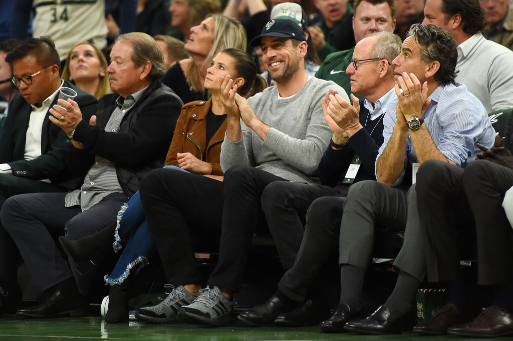 Green Bay Packers quarterback Aaron Rodgers and Danica Patrick attend Game Two of the first round of the 2019 NBA Eastern Conference Playoffs