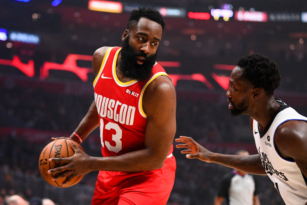 NBA player James Harden sizes up his defender