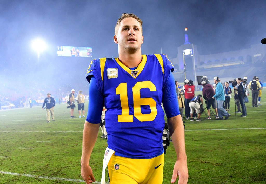 Rams quarterback Jared Goff walks off the field after a game.