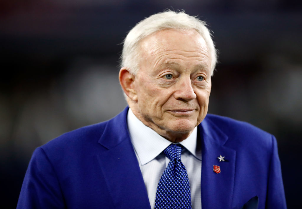 Jerry Jones walks on the field before the game.