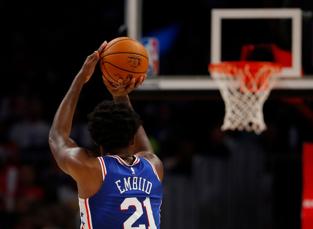 Joel Embiid #21 of the Philadelphia 76ers shoots a three-point basket