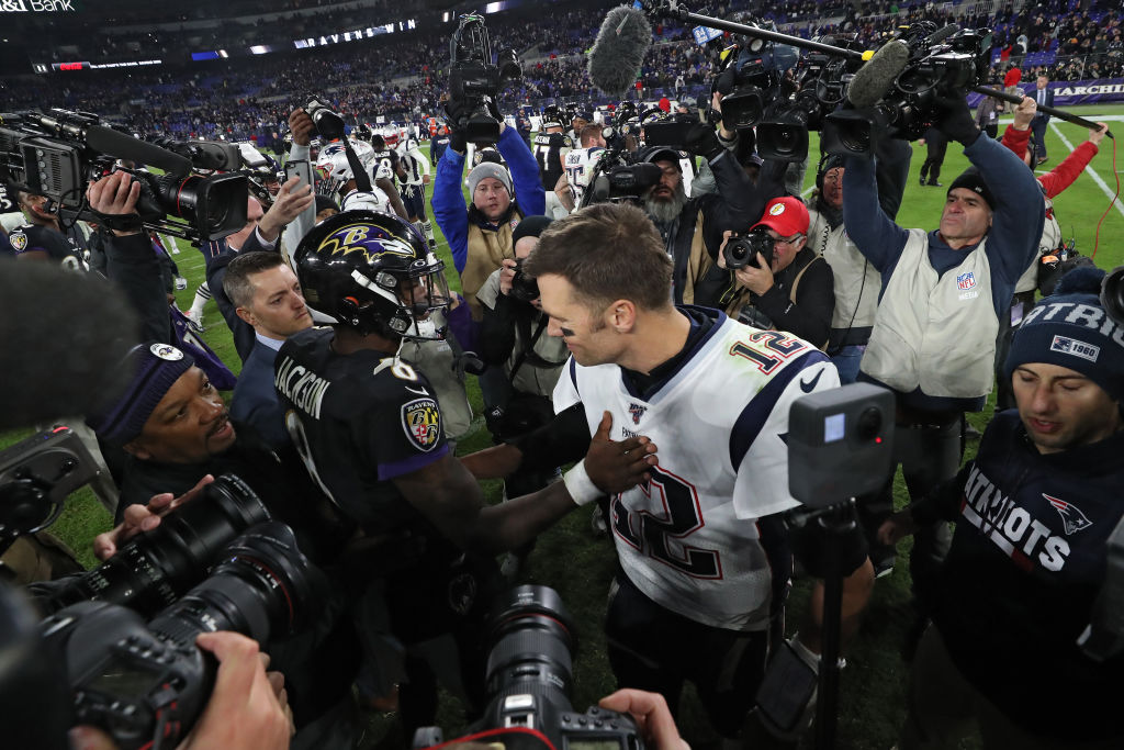 Lamar Jackson and Tom Brady exchange words after the game