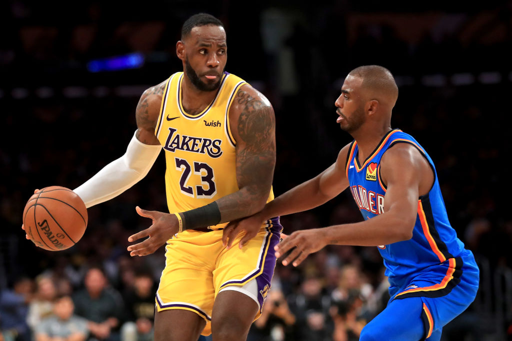 LeBron James sizes up his options with Chris Paul defending