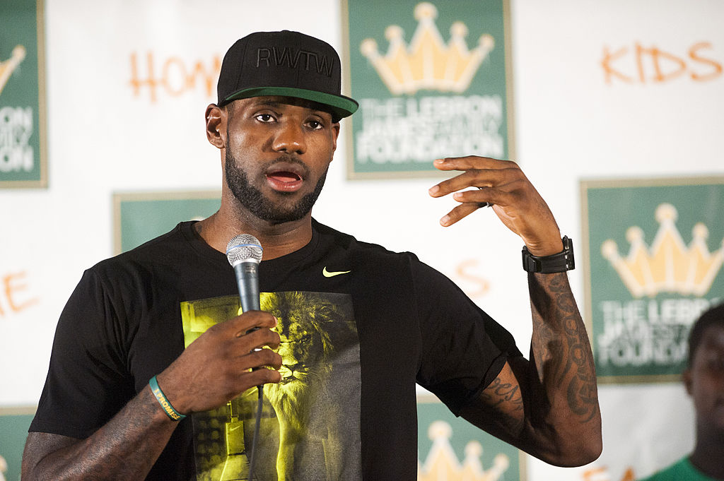 LeBron James talks into the mic during a press conference.