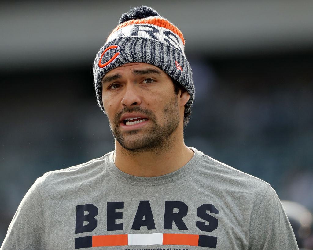 Latino NFL player, Mark Sanchez warming up for the Bears.