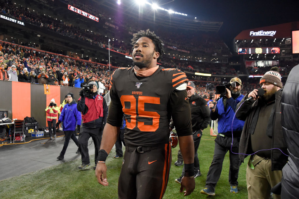 Myles Garrett walking off the field after being ejected.