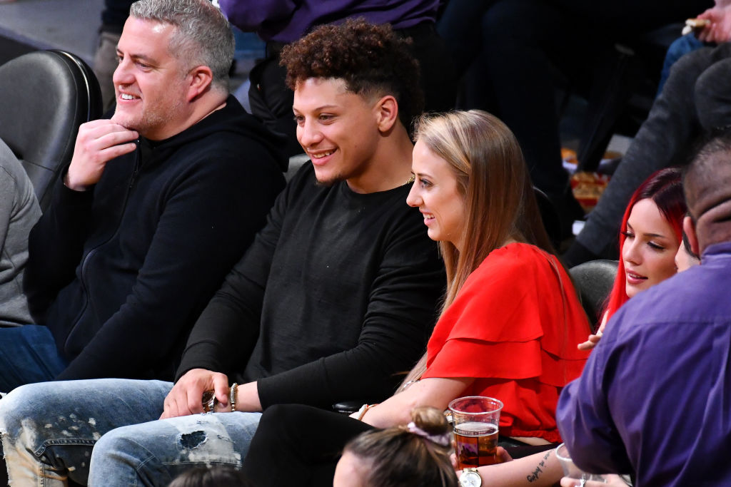 Patrick Mahomes and Brittany Matthews attend a basketball game