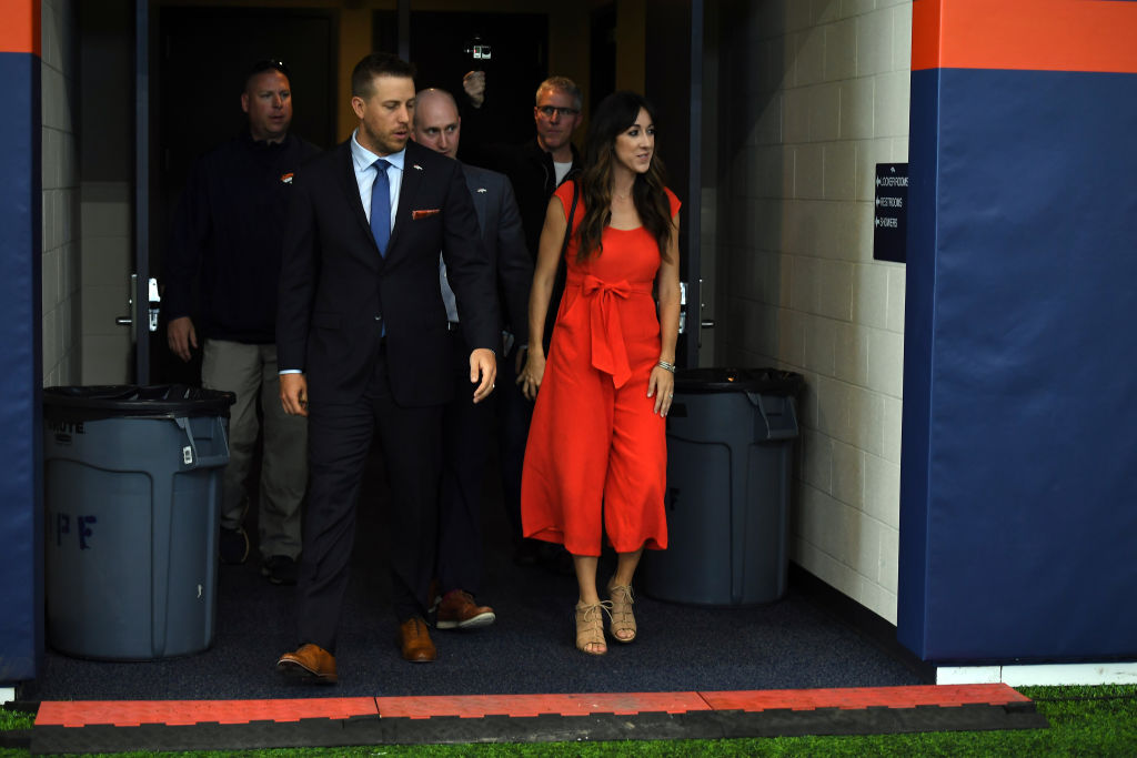 Case Keenum and his wife, Kim, walking out of the tunnel