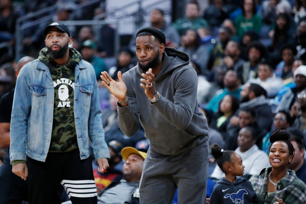 LeBron James of the Los Angeles Lakers reacts while watching son Bronny play with Sierra Canyon High School