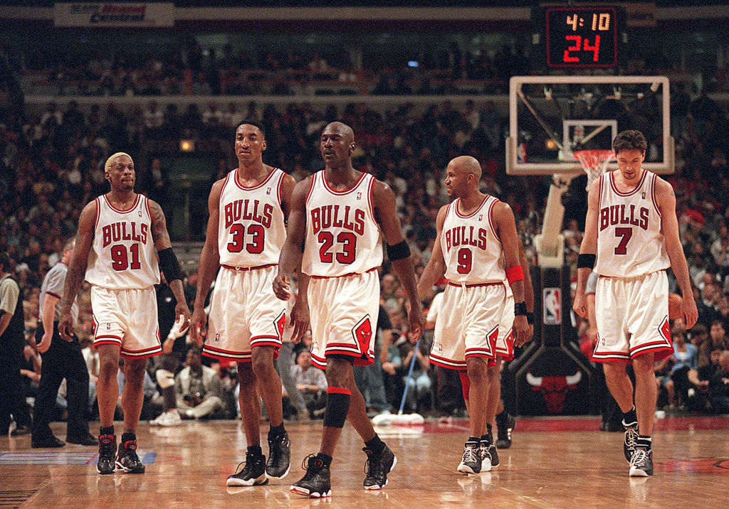 Michael Jordan walking up the court with his teammates