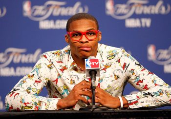 Famous NBA player/fashion icon Russell Wilson dressed up after a game.