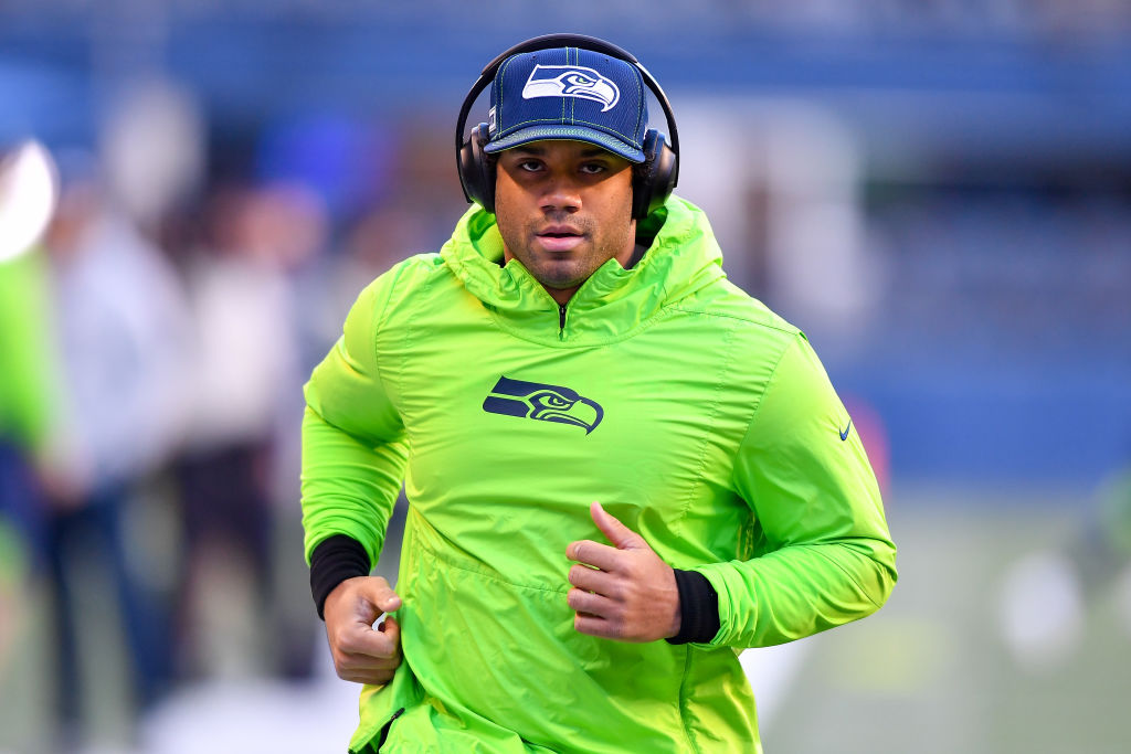 Russell Wilson of the Seattle Seahawks warms up