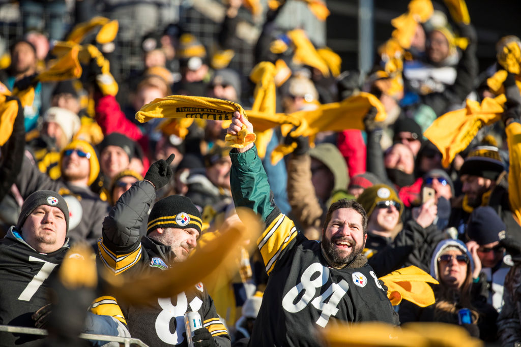 Pittsburgh Steelers fans wave terrible towels during the 2018 AFC Divisional Playoff game
