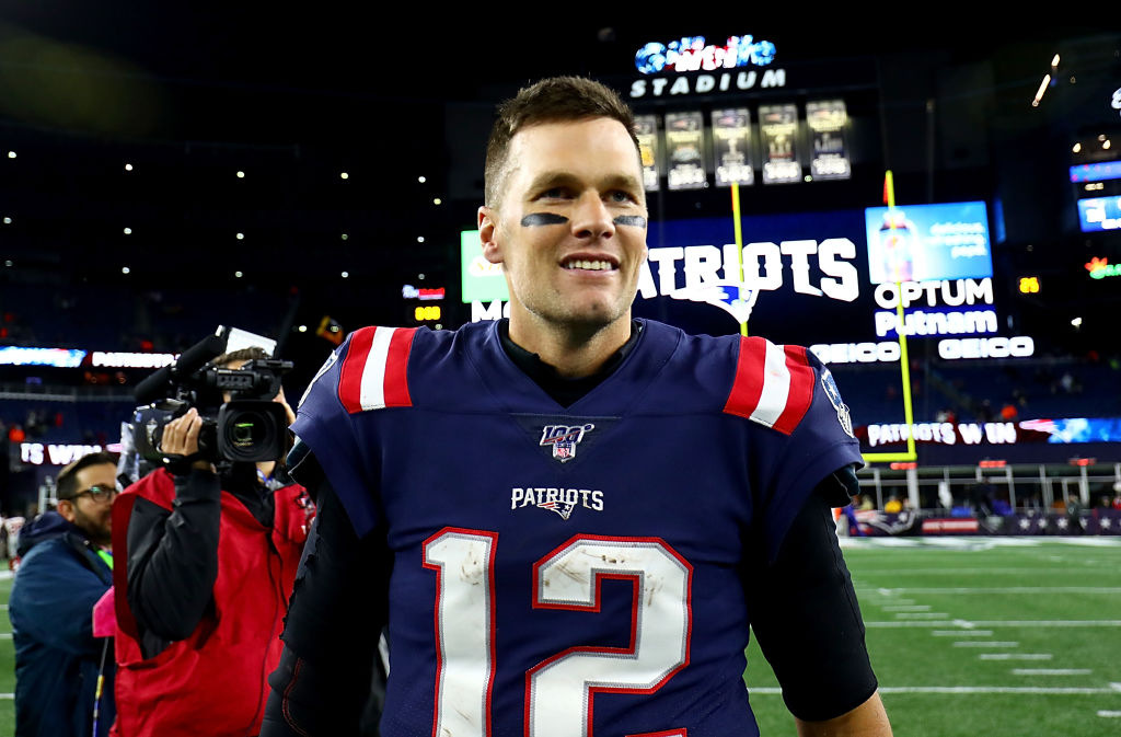 Tom Brady of the New England Patriots celebrates after defeating the New York Giants