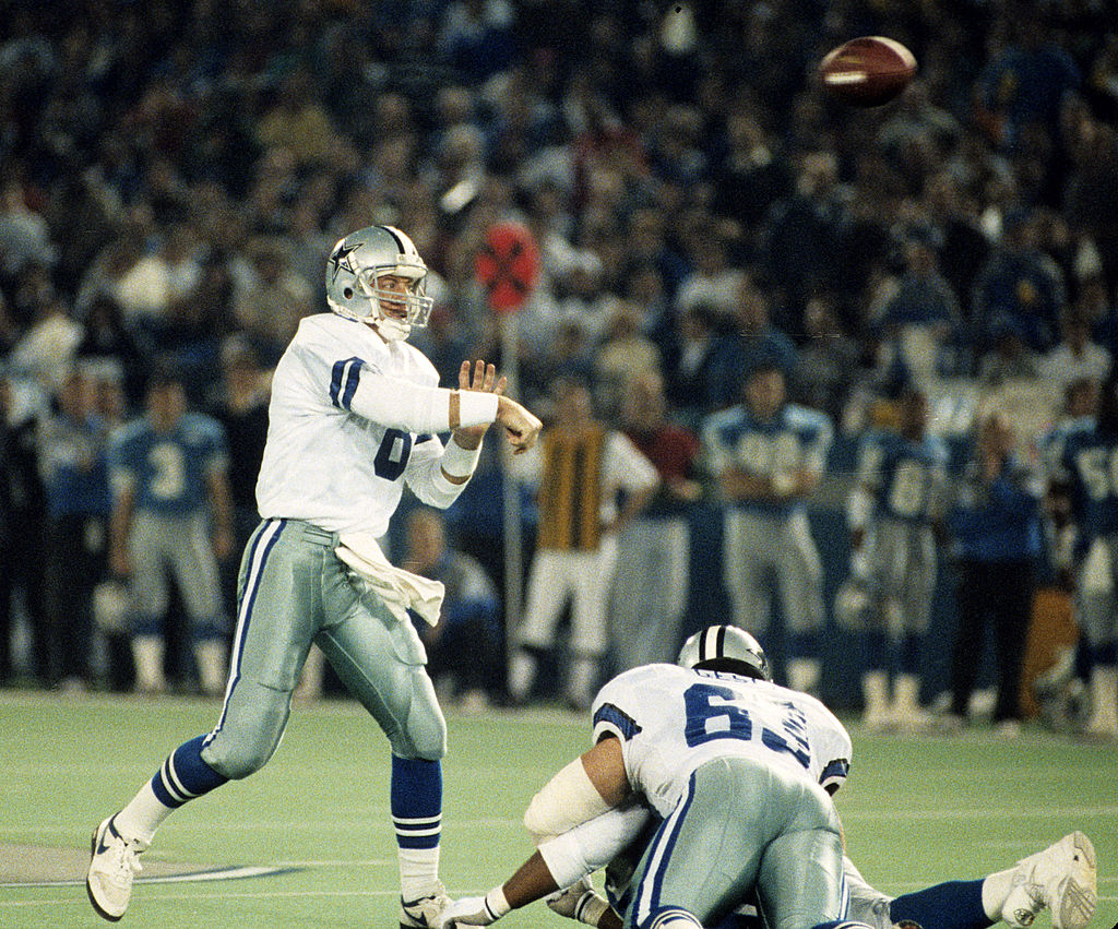 Former Cowboys quarterback Troy Aikman says owner Jerry Jones is making life tougher on head coach Jason Garrett.