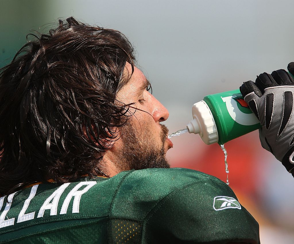 Brandon Chillar of the Green Bay Packers drinks water