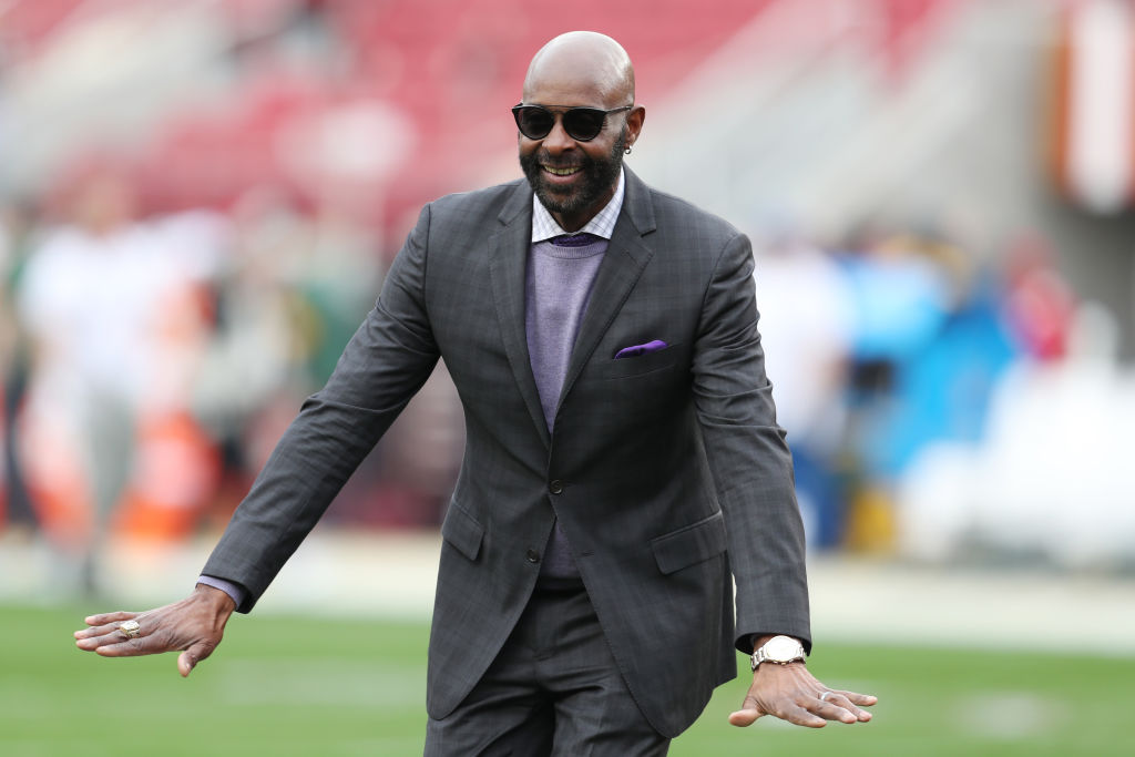 Former San Francisco 49ers wide receiver Jerry Rice gestures after making a couple catches
