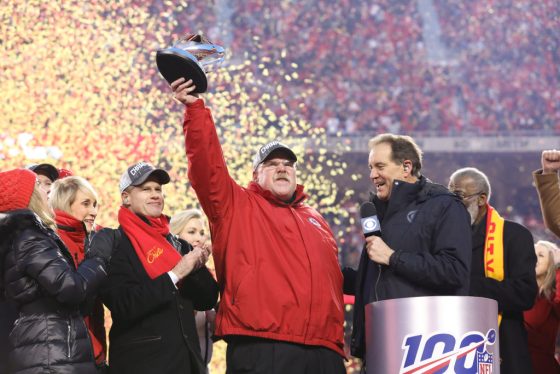 Kansas City Chiefs head coach Andy Reid lifts the Lamar Hunt Trophy over his head after the AFC Championship game