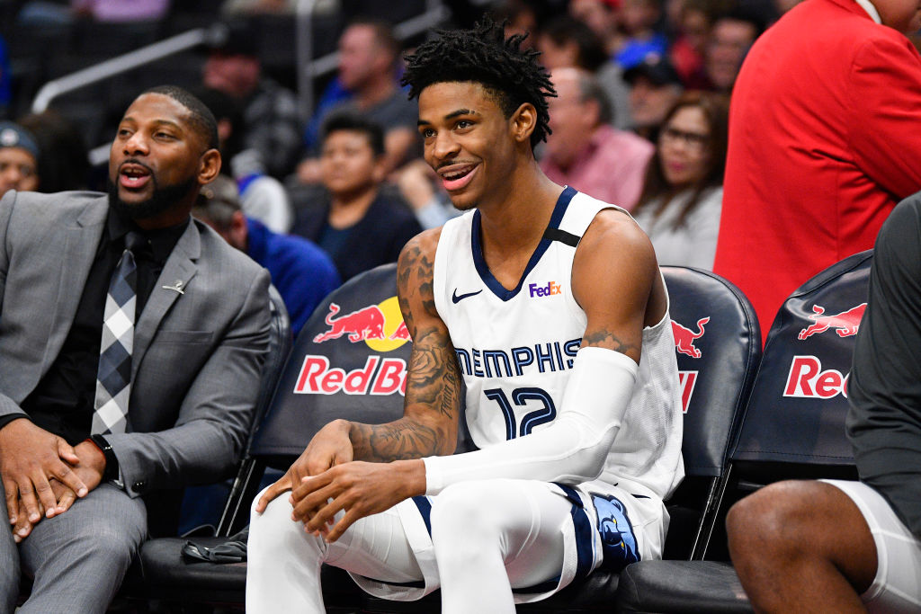 Memphis Grizzlies Guard Ja Morant looks on from the bench before an NBA game