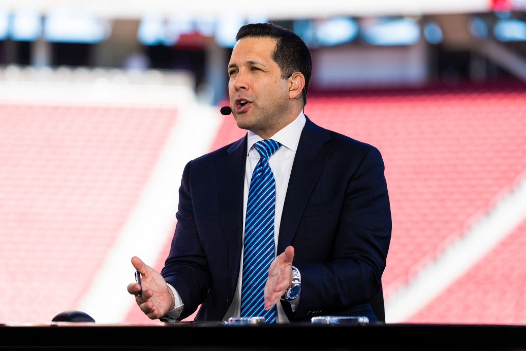 Adam Schefter talking on a television set