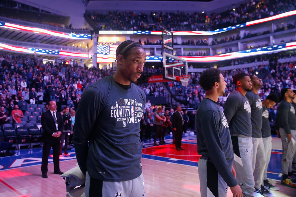 DeMar DeRozan of the San Antonio Spurs stands for the national anthem