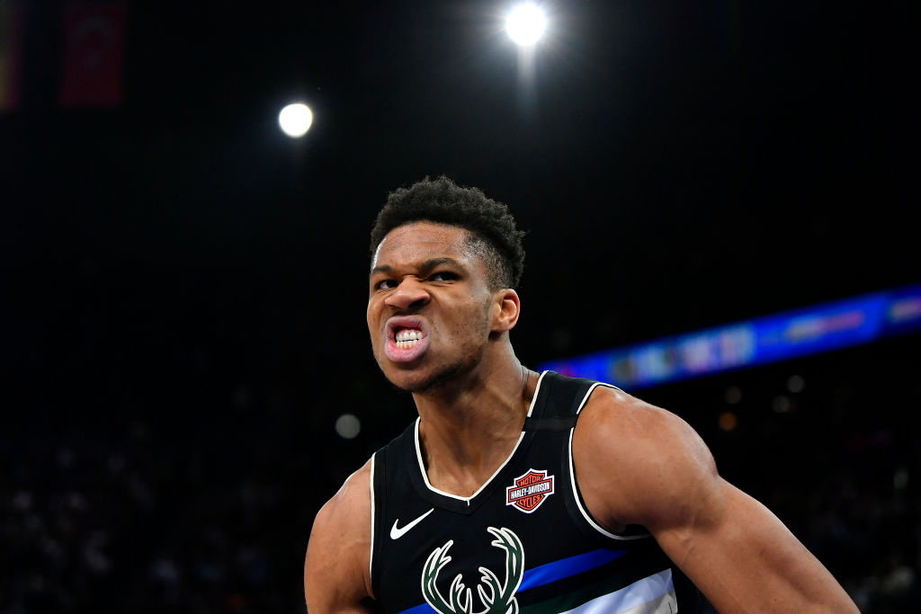 Giannis Antetokounmpo of the Milwaukee Bucks reacts after a dunk