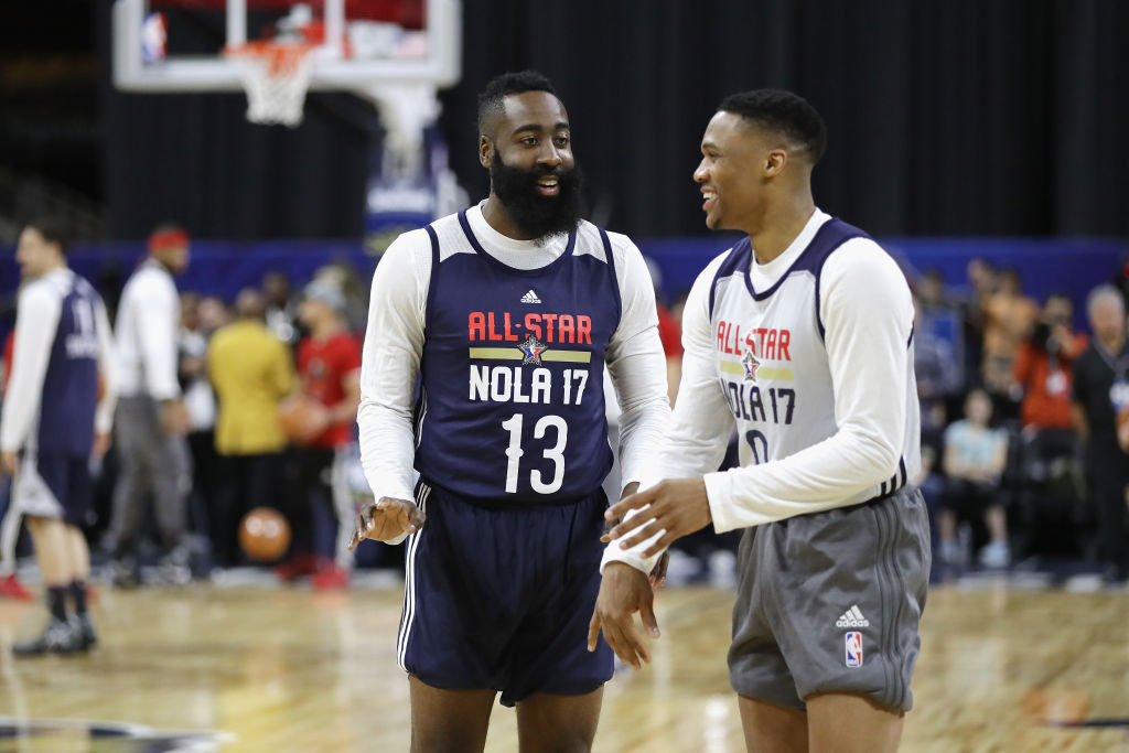 James Harden talks with Russell Westbrook during practice for the 2017 NBA All-Star Game