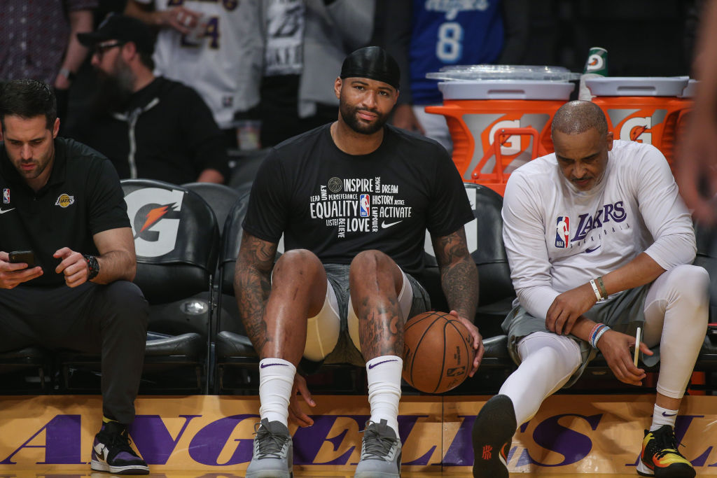Los Angeles Lakers center DeMarcus Cousins watched from the bench