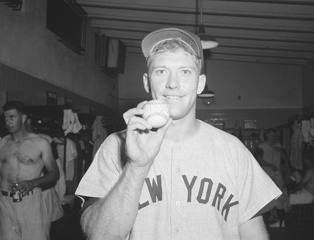 Mickey Mantle holding a baseball