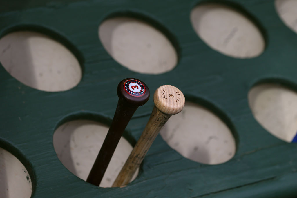 The bats of the Washington Nationals sit on the bat rack