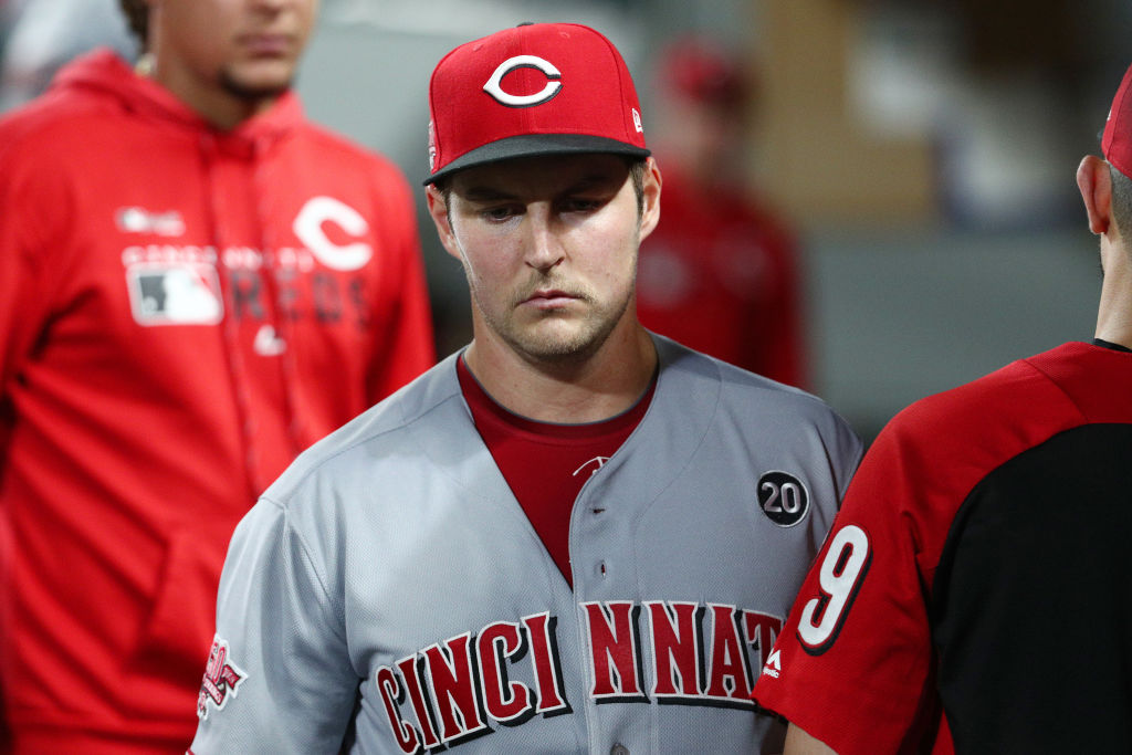Trevor Bauer of the Cincinnati Reds reacts in the dugout